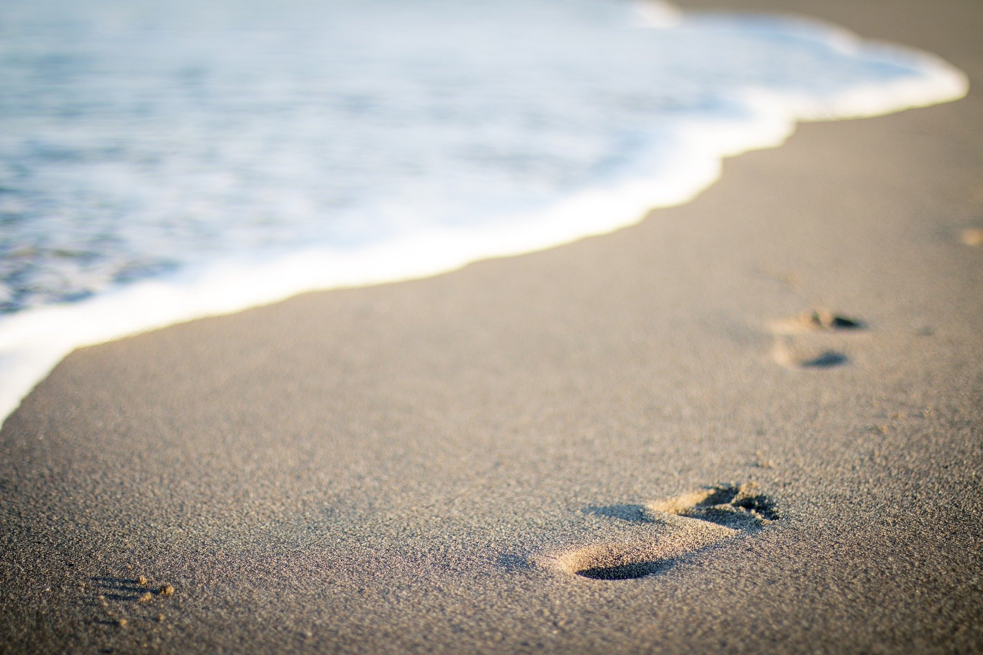 Start Living the Life You Desire. footprint. water. sea. sand. www.blisslife.in